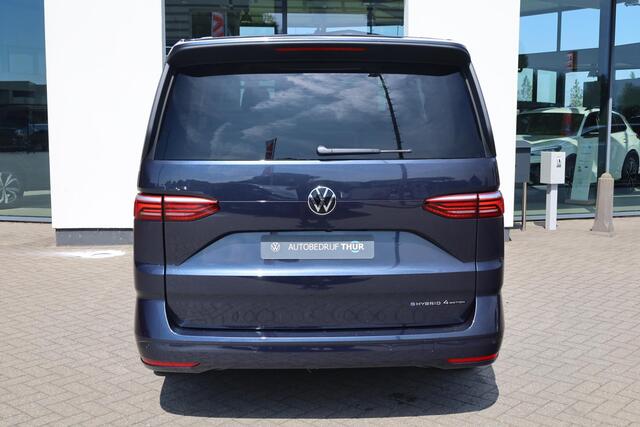 Volkswagen MULTIVAN 1.5 eHybrid L2 Bulli Edition 4Motion 245PK / 180kW LED Matrix IQ.Light, achteruitrijcamera, verwarmbare voorstoelen, airco separaat achter (3-zone Climatronic), elektr. uitklapbare trekhaak, automatisch inparkeren (Park Assist), verwarmbare voorruit, Trav