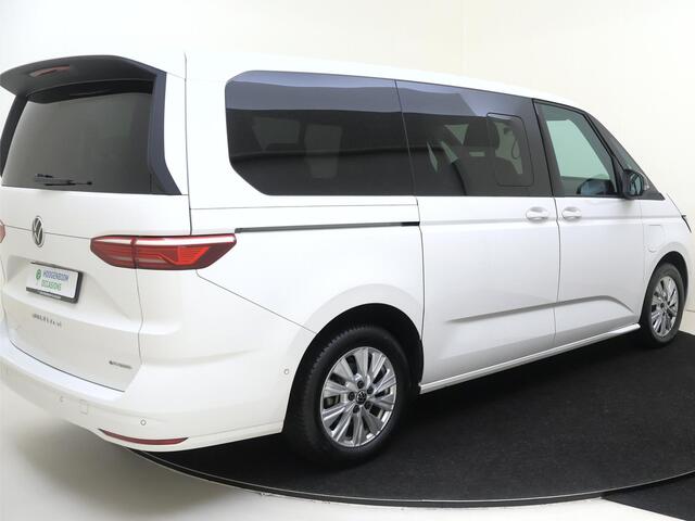 Volkswagen MULTIVAN 1.4 eHybrid L2 Style 6 versnellingen DSG | SoH 94% | 7p | Parkeerassistent | Stoelverwarming | Achteruitrijcamera | Navigatie | 3-zone airco | CarPlay |
