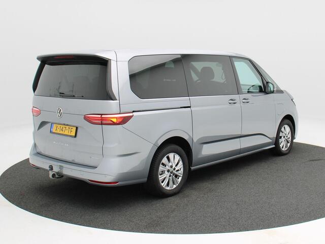 Volkswagen MULTIVAN 1.4 eHybrid 218 Pk Automaat L2H1 Style 7 Persoons | Panorama dak | Trekhaak | Stoelverwarming | Camera | CarPlay | Navigatie | 17 Inch | 19.071 Km !!
