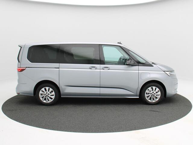 Volkswagen MULTIVAN 1.4 eHybrid 218 Pk Automaat L2H1 Style 7 Persoons | Panorama dak | Trekhaak | Stoelverwarming | Camera | CarPlay | Navigatie | 17 Inch | 19.071 Km !!
