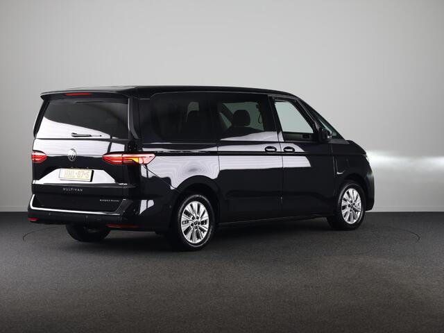 Volkswagen MULTIVAN 1.5 eHybrid L2 Economy Business 4Motion | 7 Zits | Zwenkbare Trekhaak | Navigatie | Achteruitrij Camera | Parkeer hulp | 65% getinte ruiten achter |
