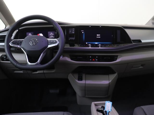 Volkswagen MULTIVAN 1.5 eHybrid L1 Economy Business 4Motion | Wegklapbare trekhaak | Sluithulp achterklep | Armleuning voorstoelen | Familie pakket | zitopstelling 2-2-3 met Vis a Vis |