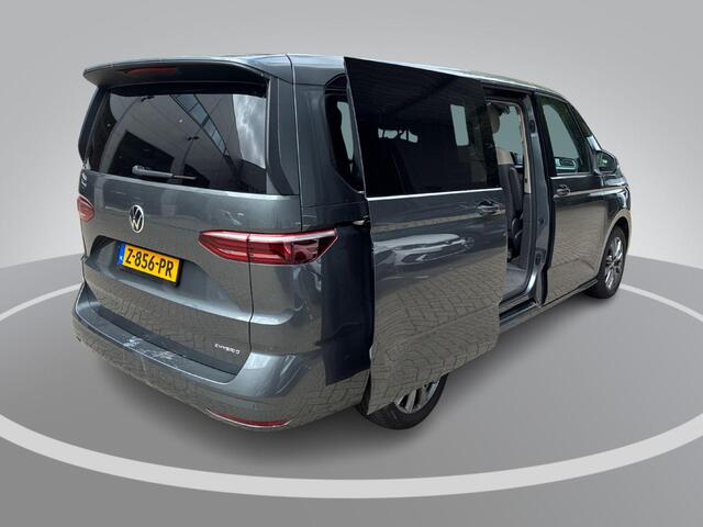 Volkswagen MULTIVAN 1.4 218pk DSG eHybrid L2H1 Life Business · Glazen dak · Trekhaak · Camera · Elek. Schuifdeuren · Apple/Android Car Play · 7 Persoons · 18'' Inch · Garantie t/m 02-06-2028 of 100.000km