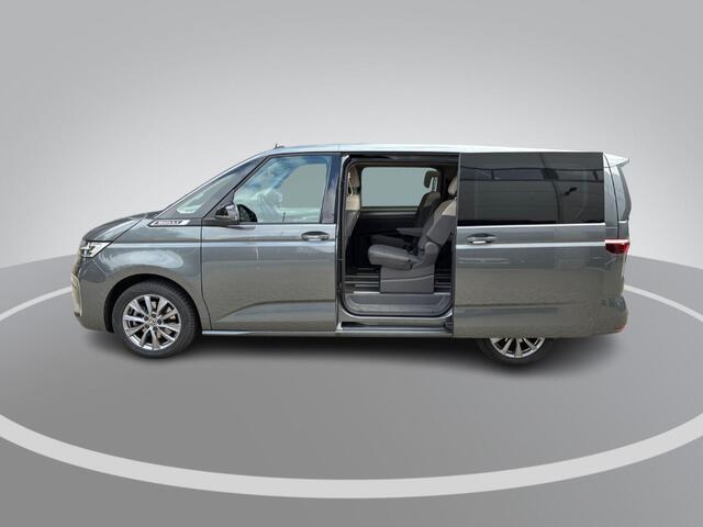 Volkswagen MULTIVAN 1.4 218pk DSG eHybrid L2H1 Life Business · Glazen dak · Trekhaak · Camera · Elek. Schuifdeuren · Apple/Android Car Play · 7 Persoons · 18'' Inch · Garantie t/m 02-06-2028 of 100.000km