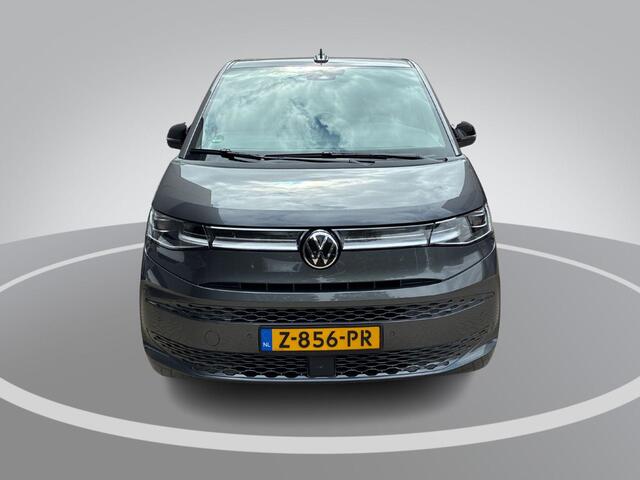 Volkswagen MULTIVAN 1.4 218pk DSG eHybrid L2H1 Life Business · Glazen dak · Trekhaak · Camera · Elek. Schuifdeuren · Apple/Android Car Play · 7 Persoons · 18'' Inch · Garantie t/m 02-06-2028 of 100.000km