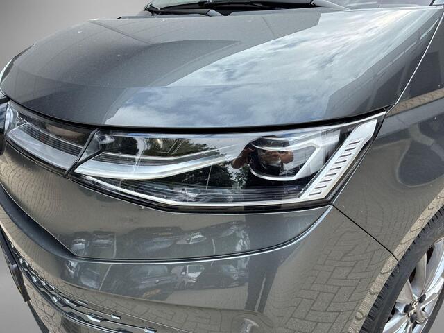 Volkswagen MULTIVAN 1.4 218pk DSG eHybrid L2H1 Life Business · Glazen dak · Trekhaak · Camera · Elek. Schuifdeuren · Apple/Android Car Play · 7 Persoons · 18'' Inch · Garantie t/m 02-06-2028 of 100.000km