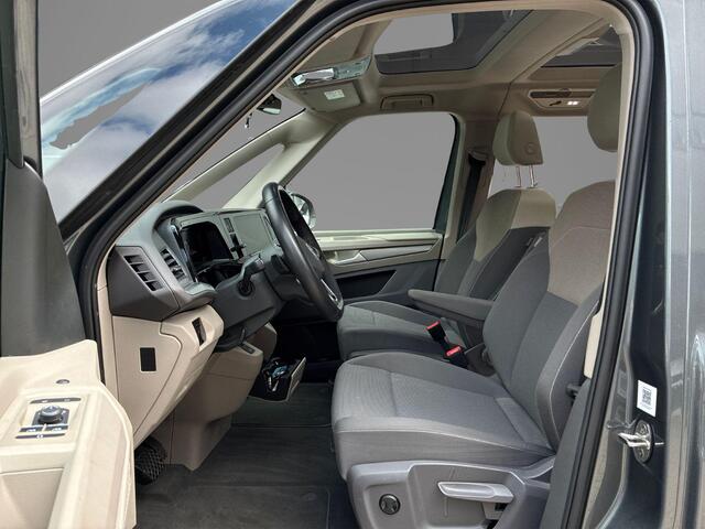 Volkswagen MULTIVAN 1.4 218pk DSG eHybrid L2H1 Life Business · Glazen dak · Trekhaak · Camera · Elek. Schuifdeuren · Apple/Android Car Play · 7 Persoons · 18'' Inch · Garantie t/m 02-06-2028 of 100.000km