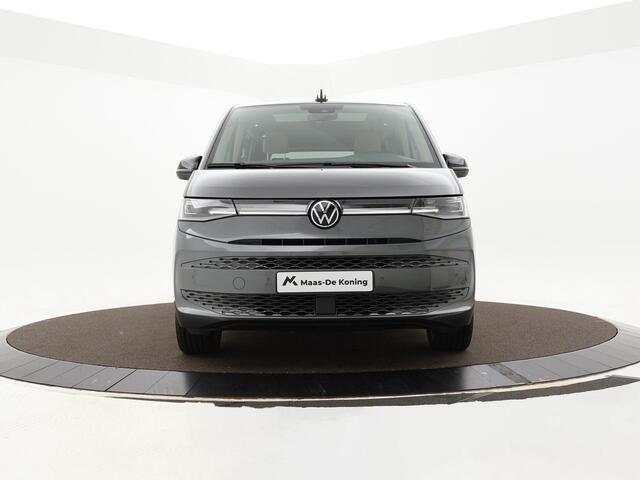 Volkswagen MULTIVAN 1.4 218pk DSG eHybrid L2H1 Life Business · Glazen dak · Trekhaak · Camera · Elek. Schuifdeuren · Apple/Android Car Play · 7 Persoons · 18'' Inch · Garantie t/m 02-06-2028 of 100.000km