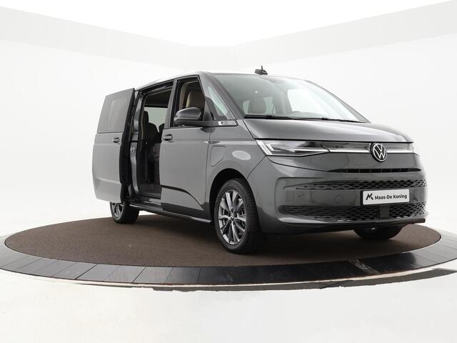 Volkswagen MULTIVAN 1.4 218pk DSG eHybrid L2H1 Life Business · Glazen dak · Trekhaak · Camera · Elek. Schuifdeuren · Apple/Android Car Play · 7 Persoons · 18'' Inch · Garantie t/m 02-06-2028 of 100.000km