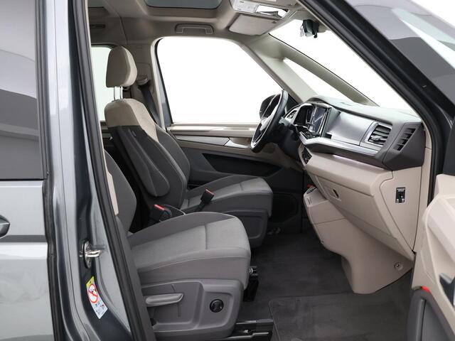Volkswagen MULTIVAN 1.4 218pk DSG eHybrid L2H1 Life Business · Glazen dak · Trekhaak · Camera · Elek. Schuifdeuren · Apple/Android Car Play · 7 Persoons · 18'' Inch · Garantie t/m 02-06-2028 of 100.000km