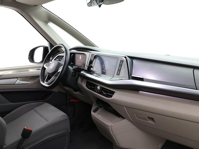 Volkswagen MULTIVAN 1.4 218pk DSG eHybrid L2H1 Life Business · Glazen dak · Trekhaak · Camera · Elek. Schuifdeuren · Apple/Android Car Play · 7 Persoons · 18'' Inch · Garantie t/m 02-06-2028 of 100.000km