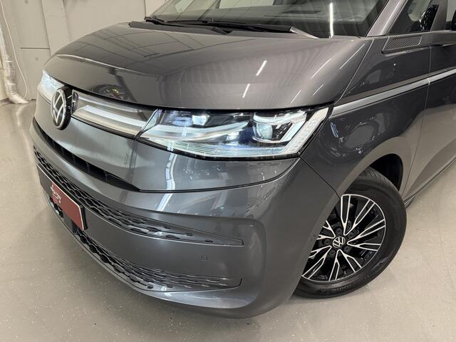 Volkswagen MULTIVAN 1.4 eHybrid Energetic 7p. PANO/LEER+MASSAGE/ADAPTIVE-ONDERSTEL/H&K/HEAD-UP/KEYLESS/EL.SCHUIFDEUREN/SFEER/ACC/CAMERA/PRIVACY/EL.A.KLEP/INDIUMGRAU METALLIC/VOLLEDIG VW DEALER HISTORIE