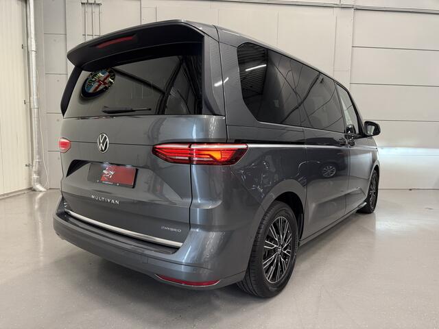 Volkswagen MULTIVAN 1.4 eHybrid Energetic 7p. PANO/LEER+MASSAGE/ADAPTIVE-ONDERSTEL/H&K/HEAD-UP/KEYLESS/EL.SCHUIFDEUREN/SFEER/ACC/CAMERA/PRIVACY/EL.A.KLEP/INDIUMGRAU METALLIC/VOLLEDIG VW DEALER HISTORIE