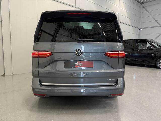 Volkswagen MULTIVAN 1.4 eHybrid Energetic 7p. PANO/LEER+MASSAGE/ADAPTIVE-ONDERSTEL/H&K/HEAD-UP/KEYLESS/EL.SCHUIFDEUREN/SFEER/ACC/CAMERA/PRIVACY/EL.A.KLEP/INDIUMGRAU METALLIC/VOLLEDIG VW DEALER HISTORIE