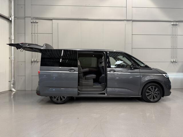 Volkswagen MULTIVAN 1.4 eHybrid Energetic 7p. PANO/LEER+MASSAGE/ADAPTIVE-ONDERSTEL/H&K/HEAD-UP/KEYLESS/EL.SCHUIFDEUREN/SFEER/ACC/CAMERA/PRIVACY/EL.A.KLEP/INDIUMGRAU METALLIC/VOLLEDIG VW DEALER HISTORIE