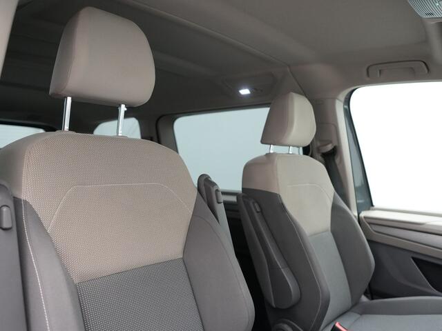 Volkswagen MULTIVAN 1.4 eHybrid Bulli 7 Zits PHEV 218pk Dealer O.H | Trekhaak Af Fabriek | Adaptive Cruise | Camera | Sportstoelen & Stuur Verwarmd | Apple Carplay | BLIS | Navigatie | Virtual | DAB | 17"L.M | Plug In Hybrid |