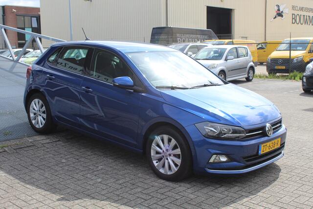 Volkswagen POLO 1.0 TSI Highline AUTOMAAT/Virtual cockpit/Navigatie/Adaptive cruise control/Achteruitrijcamera/Parkeersensoren/Apple carplay/Climate control/Stoelverwarming/Multifunctioneel stuurwiel/16'' Lichtmetalen velgen.