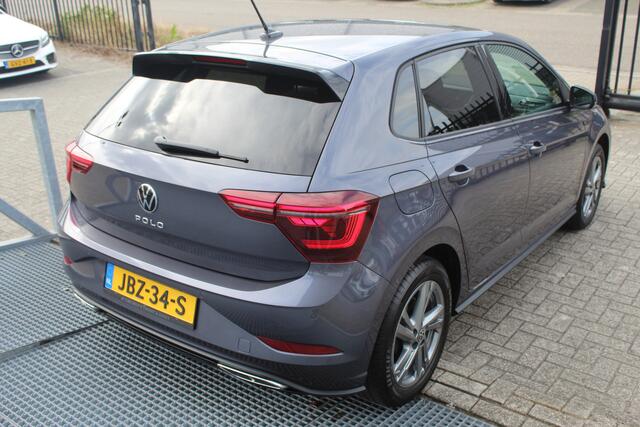 Volkswagen POLO 1.0 TSI 2x R-Line *Automaat*Navigatie/Virtual cockpit/Adaptive cruise control/Achteruitrijcamera/Parkeersensoren rondom/Apple carplay/Stoelverwarming/LED grill/IQ.light/Climate control/Draadloze telefoonlader/DAB/16''Lichtmetalen velgen.