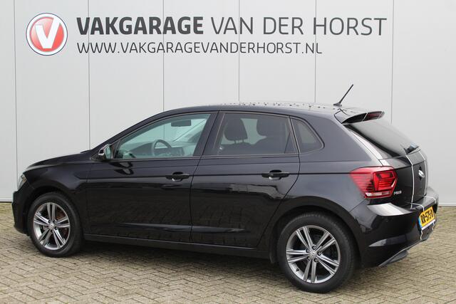 Volkswagen POLO 1.0-95pk TSI Comfortline. Zeer nette, sportieve en keurig onderhouden VW Polo. Trekhaak met afneemb. kogel, pdc v/a, volautm., camera, airco, cruise, navi, lmv etc.