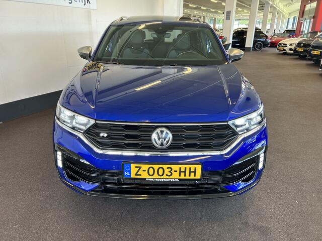 Volkswagen T-Roc 2.0 TSI 4Motion R | Panoramadak | Keyless | Beats | Dealer onderhouden | Adaptieve cruise control | Dodehoeksdetectie | Lane assist | Digital dashboard | Afneembare trekhaak | Achteruitrijcamera | Climate control | Navigatie | Stoelverwarming