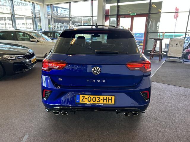 Volkswagen T-Roc 2.0 TSI 4Motion R | Panoramadak | Keyless | Beats | Dealer onderhouden | Adaptieve cruise control | Dodehoeksdetectie | Lane assist | Digital dashboard | Afneembare trekhaak | Achteruitrijcamera | Climate control | Navigatie | Stoelverwarming