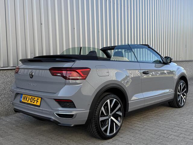 Volkswagen T-Roc Cabrio 1.5 TSI R-Line Nardo Grijs | Camera | ACC | Keyless | Trekhaak | Matrix LED | Park Assist | Dodehoekassistent | CarPlay | Stoelverwarming | Stuurverwarming | Sfeerverlichting | Beats Audio