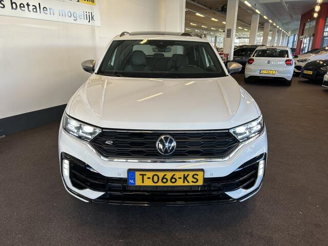 Volkswagen T-Roc 2.0 TSI 4Motion R 300PK | Panoramadak | Digital dashboard | Beats audio | Adaptieve cruise control | Adaptief onderstel | Lane assist | Dodehoeksdetectie | Achteruitrijcamera | Stoelverwarming | Kleppensysteem | Elek. inklapbare spiegels
