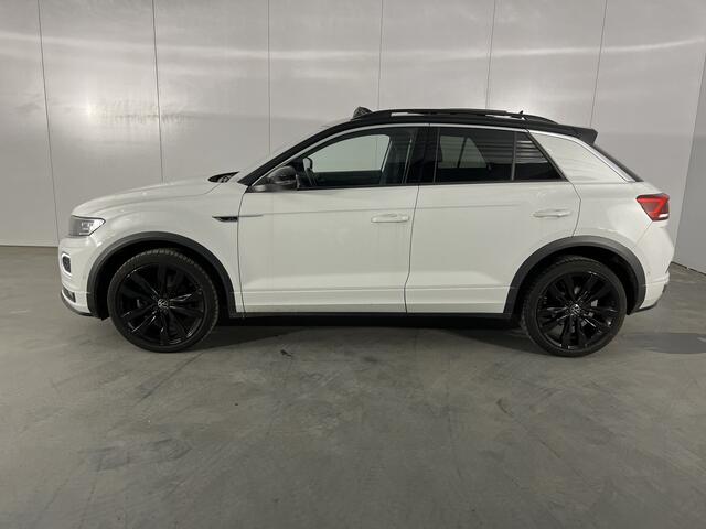 Volkswagen T-Roc 1.5 TSI R-Line / AUTOMAAT/ PANO/ STUUR+STOELVERWARM./ PARK.SENSOR.V+A/ CAMERA/ DODE HOEK/ APP-CONNECT/ ELEK.KLEP/ KEYLESS/ ACC/ RIJ-MODI/ DIGITAL DASH/ NAVI/ DAB/ CLIMA/ LED/ ISOFIX