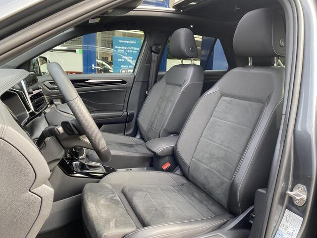 Volkswagen T-Roc 1.5 TSI R-Line Business+ / Automaat / Open-Panodak / Massage-Stoelen / Adaptieve Cruise-Control / Stoelverwarming / Matrix-LED / Sfeerverlichting / Apple-Carplay & Android-Auto / Draadloze-Telefoonlader / Climate-Control / Flippers / DAB Radio-Bluetooth /