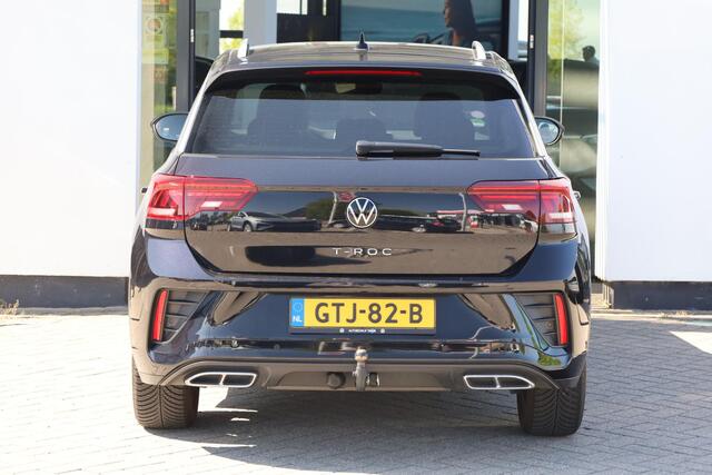 Volkswagen T-Roc 1.5 TSI R-Line Afneembare trekhaak Digital cockpit, R-Line in- en exterieur, achteruitrijcamera, navigatie, spiegel pakket, park assist, light assist, LED plus, adaptieve cruise control (acc), licht & regensensor, climatronic, draadloos Apple Carplay / An
