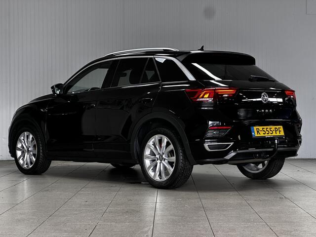 Volkswagen T-Roc 1.5 TSI Sport Business R/ Automaat!/ Trekhaak/ Zwarte hemel/ Virtual Cockpit/ LED Koplampen/ 18''LMV/ Stoelverw./ Grootlichtass./ Flippers/ Apple+Android/ DAB+/ Clima/ Navi/ Cruise/ Bluetooth/ Multi.Stuur/ PDC V+A.