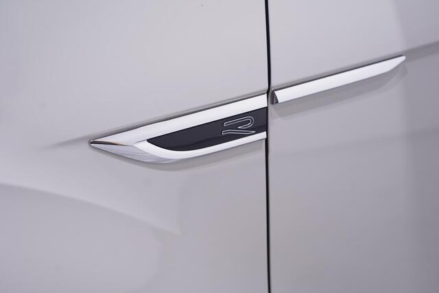 Volkswagen T-Roc 1.5 TSI R-Line NAP 2e eigen. r-line interieur/exterieur Comfort-pack Private-glas Multimedia-pack Led-verlichting 18"-lmv PDC v+a Black-pack electrische-achterklep ACC stoelverwarming ECC Navigatie Camera APPLE-carplay