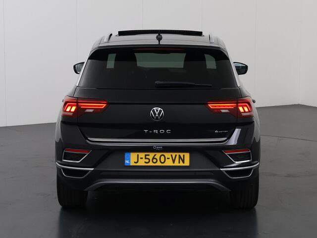 Volkswagen T-Roc 2.0 TSI 4Motion Sport | Panoramadak | Virtual Cockpit | Navigatie | Camera | DAB | Apple CarPlay/Android Auto | Stoelverwarming | Adaptieve Cruise Control | Ele. kofferdeksel | Trekhaak | 1700kg Trekkracht |