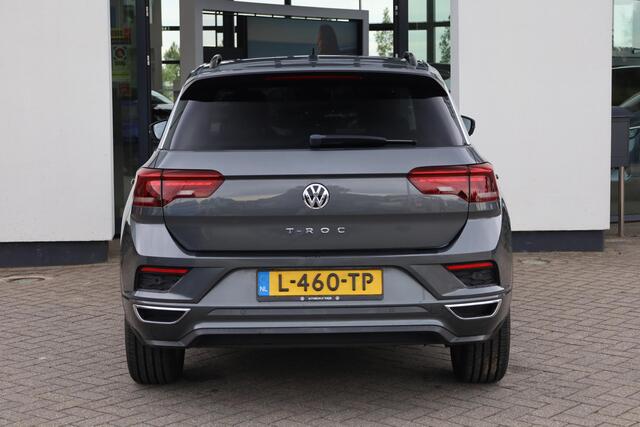 Volkswagen T-Roc 1.5 TSI Sport Business R 150PK / 110kW DSG, Panoramadak, R-Line in- en exterieur, achteruitrijcamera (rear view), parkeersensoren voor en achter (pdc), 18" 'Sebring' LMV, elektrisch verstel-, verwarm- en inklapbare buitenspiegels (spiegelpakket), lendesteun, LED verlichting, navigatie, verwarmbare voorstoelen, DAB+, elektrische achterklep, adaptieve cruise control (acc), Apple Carplay & Android Auto, keyless start & entry etc.
