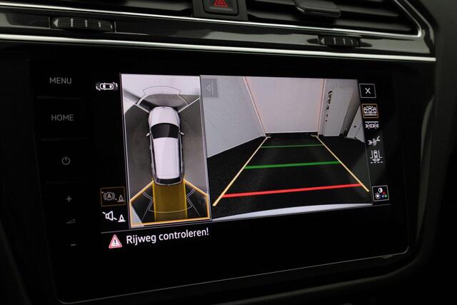 Volkswagen TIGUAN 1.4 TSI 245 pk DSG eHybrid R-Line Business+ | Panoramadak | Navigatie Discover Pro | Adaptief onderstel | Rondomzicht camera | Stoel-/achterbankverwarming | IQ Light