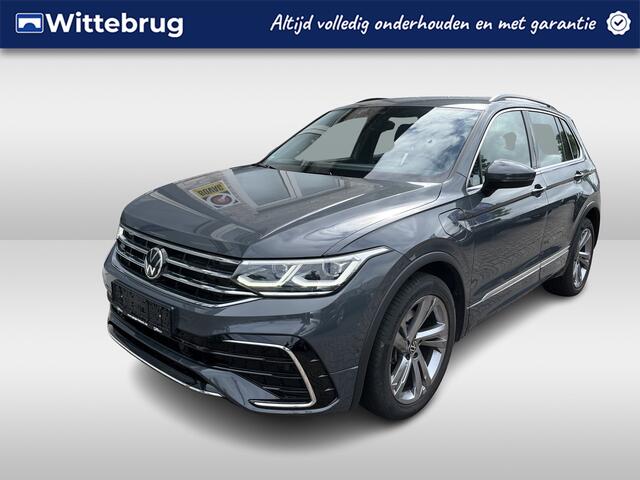 Volkswagen TIGUAN 1.4 TSI eHybrid R-Line / AUTOMAAT/ 2X R-LINE/ 245 PK / ELEKTR. TREKHAAK/ 19" LMV/ HEAD-UP DISPLAY/ DIGITAL DASH/ ADAPT. CRUISE/ PARK. SENSOREN + CAMERA/ APP-CONNECT/ NAVI/ 3-ZONE CLIMA/ STOEL-STUUR VERWARM.