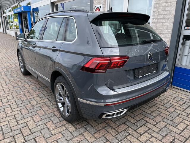 Volkswagen TIGUAN 1.4 TSI eHybrid R-Line / AUTOMAAT/ 2X R-LINE/ 245 PK / ELEKTR. TREKHAAK/ 19" LMV/ HEAD-UP DISPLAY/ DIGITAL DASH/ ADAPT. CRUISE/ PARK. SENSOREN + CAMERA/ APP-CONNECT/ NAVI/ 3-ZONE CLIMA/ STOEL-STUUR VERWARM.