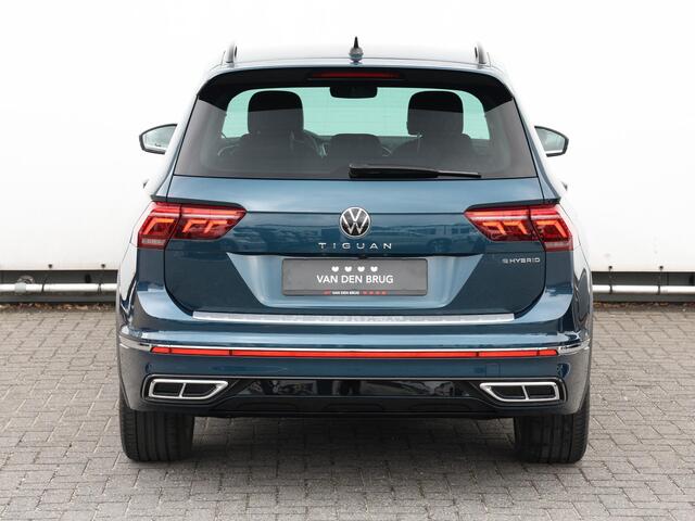 Volkswagen TIGUAN 1.4 TSI eHybrid R-Line Business 245 PK DSG | LED Matrix | Alarm | Navigatie | Camera | Keyless | Stoelverwarming | 19 Inch velgen | Electrische achterklep | Fabrieksgarantie