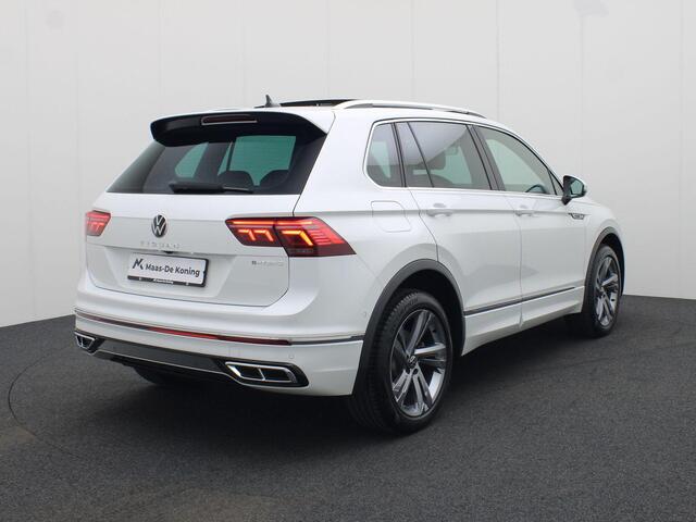 Volkswagen TIGUAN 1.4 TSIeHybrid 180kW/245PK R-Line DSG · Panoramadak · Leder · Trekhaak · Camera · Apple Car Play · Stoel & Stuurverwarming · Navigatie ·