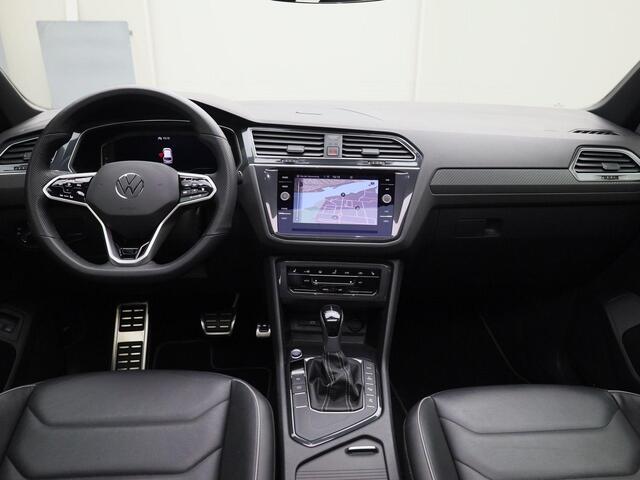 Volkswagen TIGUAN 1.4 TSIeHybrid 180kW/245PK R-Line DSG · Panoramadak · Leder · Trekhaak · Camera · Apple Car Play · Stoel & Stuurverwarming · Navigatie ·