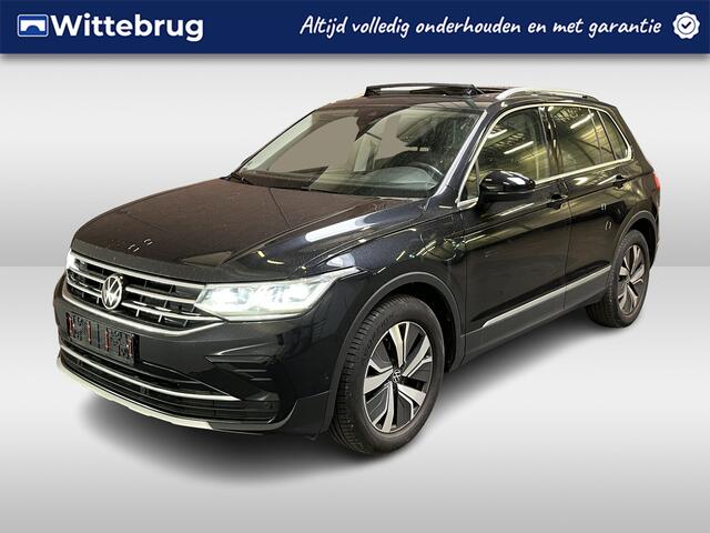 Volkswagen TIGUAN 1.4 TSI eHybrid Elegance / AUTOMAAT/ ELEKTR. TREKHAAK/ PANO/ STOELVERWARM. V+A/ PARK. SENSOREN + CAMERA/ ADAPT. CRUISE/ APP-CONNECT/ SPRAAKBEDIENING/ DIGITAL DASH/ NAVI/ 18" LMV/ CLIMA 3-ZONE