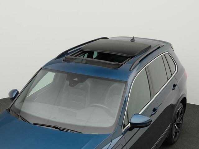 Volkswagen TIGUAN 1.4 TSI 245 pk DSG eHybrid R-Line Business+ | Pano | Trekhaak | Adaptieve ondertelregeling (DCC) | Leder 'Vienna' | 20 inch Misano velgen | IQ light | Adaptieve onderstelregeling