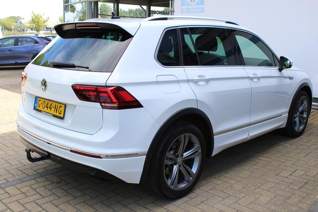 Volkswagen TIGUAN 1.5 TSI Comfortline Business R-Line | Incl. 12 maanden Garantie | Panorama dak | Stoelmassage | Virtual cockpit | Schuif/kantel dak | Stoelverwarming | Keyless entry/start | Elektrische kofferklep | Trekhaak | Parkeersensoren V+A | Climate controle | Navi
