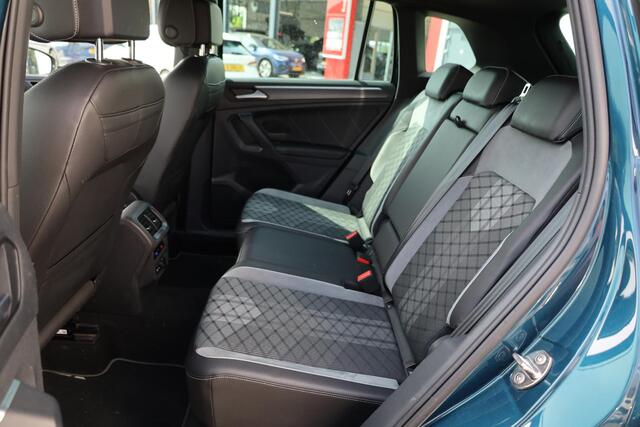Volkswagen TIGUAN 1.5 TSI R-Line Business+ 150PK / 110kW NL auto 1e eigenaar nieuw door ons geleverd en onderhouden panoramadak Achteruitrijcamera bestuurders assistentie pakket side assist 20" LMV Misano wegklapbare trekhaak adaptieve onderstelregeling DCC executive R li