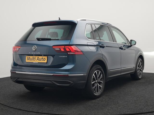 Volkswagen TIGUAN 1.4 TSI eHybrid Life Plug In Hybrid 245pk Dealer O.H PHEV | Trekhaak Af Fabriek | Panodak | Adaptive Cruise | Camera | Sportstoelen Verwarmd | Navigatie | Stuurverwarming | Virtual | DAB |