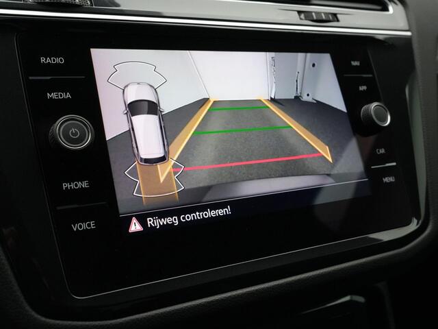 Volkswagen TIGUAN 1.5 TSI 150 pk DSG R-Line Business+ | Black Style | Panoramadak | Adaptieve onderstelregeling (DCC) | IQ Light | Achteruitrijcamera | Adpative Cruise | Carplay | DAB | 20 inch