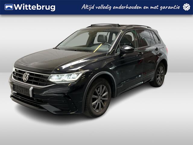 Volkswagen TIGUAN 1.4 TSI eHybrid R-Line / AUTOMAAT/ 2X R-LINE/ PANO/ ELEKTR. TREKHAAK/ CLIMA 3-ZONE/ ADAPT. CRUISE/ DIGITAL DASH/ APP-CONNECT/ NAVI/ PARK. SENSOREN/ STOEL-STUUR VERWARM.