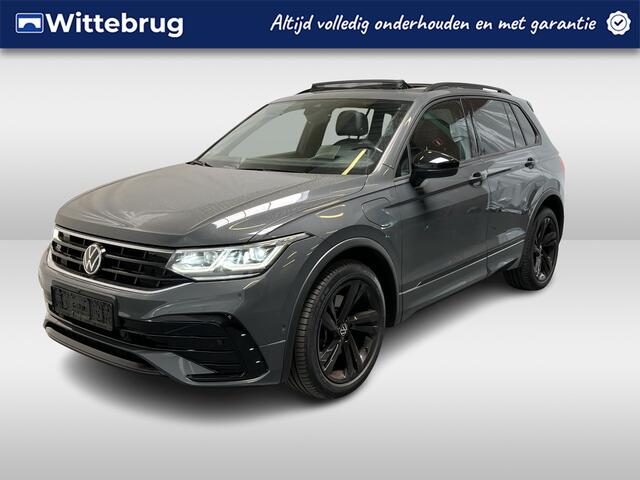 Volkswagen TIGUAN 1.4 TSI eHybrid R-Line / AUTOMAAT/ PANO/ 2X R-LINE/ PARK.SENSOR.V+A/ CAMERA/ TREKHAAK/ ELEK. KLEP/ STUUR+STOEL VERWARM./ DCC/ HEAD-UP/ KEYLESS/ DODEHOEK/ APP-CONNECT/ ACC/ NAVI/ DAB/ CLIMA/ LED/ 19'' LMV