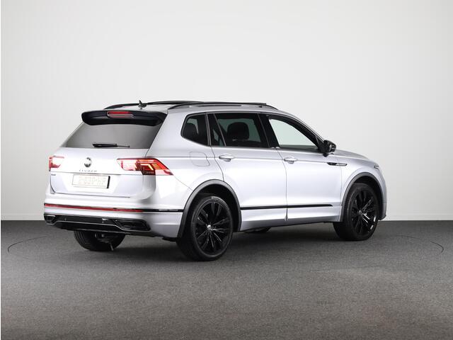 Volkswagen TIGUAN Allspace 1.5 TSI R-Line Business 7p. 150 pk | Verlengde garantie | Navigatie | Panoramadak | Parkeersensoren | Adaptieve cruise control | Stoelverwarming | Matrix LED koplampen |