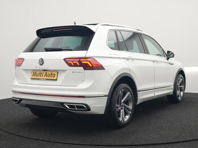 Volkswagen TIGUAN 1.4 TSI eHybrid R-Line Business+ Plug In Hybrid 245pk Dealer O.H. PHEV | Panodak | Adaptive Cruise | 360 Camera | IQ Light | Lederen Stoelen Memory & Verwarmd | Apple Carplay | Stuur Verwarmd | Sfeerverlichting | Virtual | Navigatie | Blis | DAB |